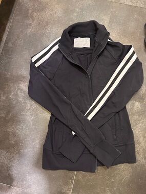 Athleta Black Jacket with White Sleeve Stripes
